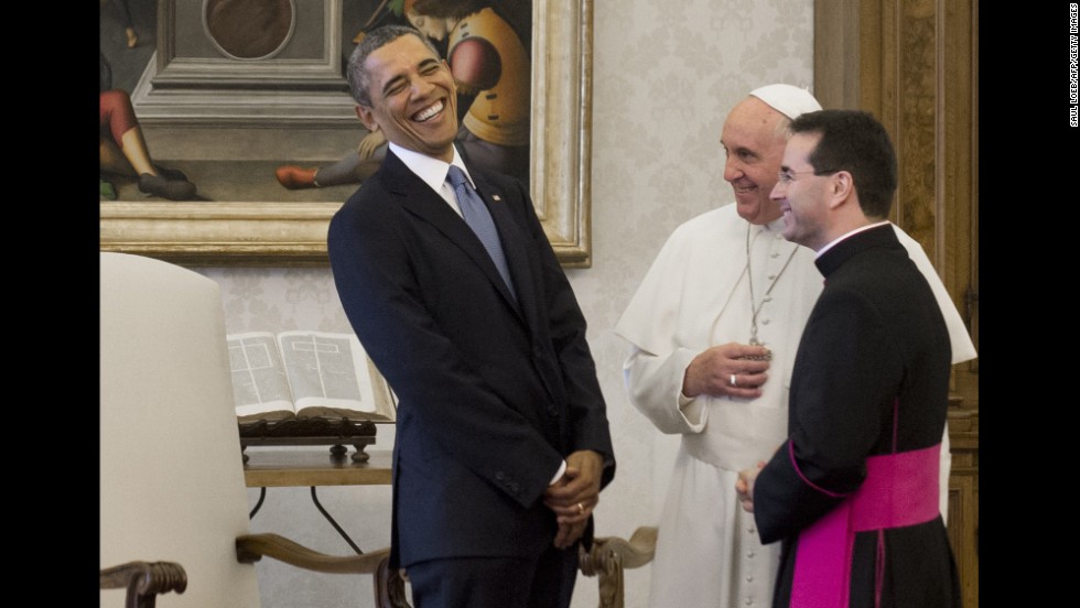 Francis speaks with U.S. President Barack Obama, who visited the Vatican in March 2014.