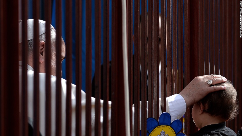 The Pope meets faithfuls as he visits the San Gregorio Parish in Rome in April 2014.