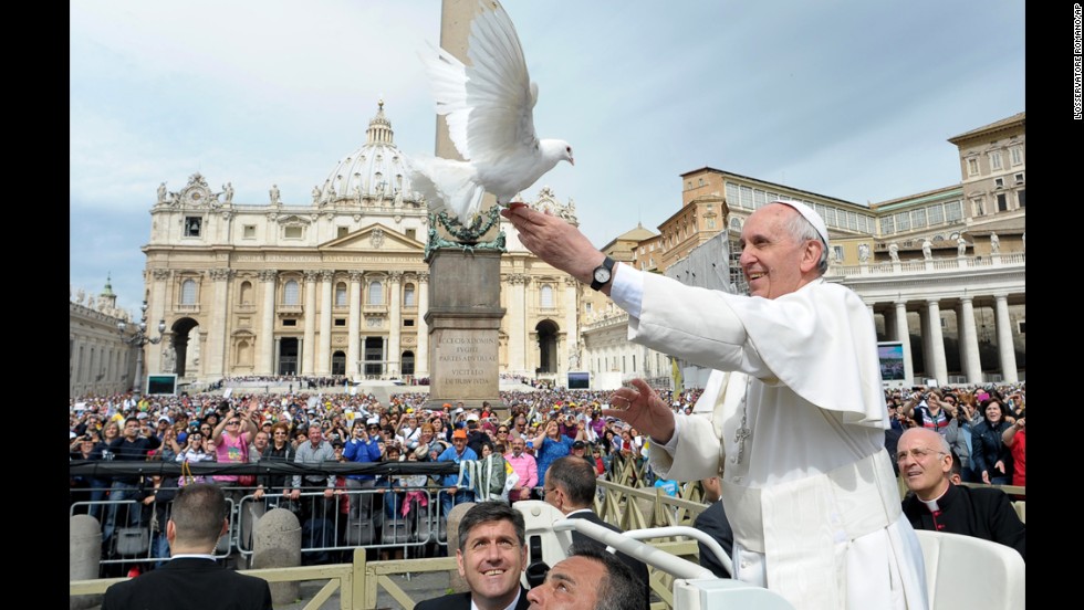 Francis frees a dove in May 2013 during his weekly general audience in St. Peter's Square.