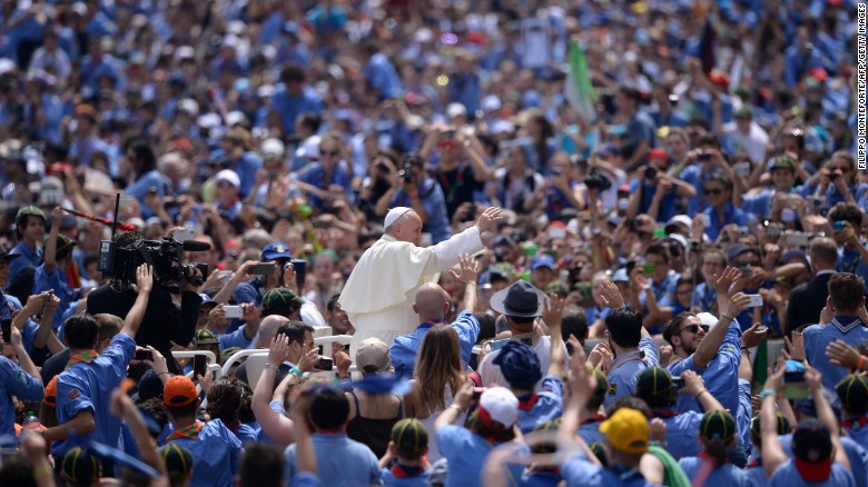 Pope Francis greets a crowd of Italian Catholic boy scouts and girl guides at St. Peter's Square on Saturday, June 13.
