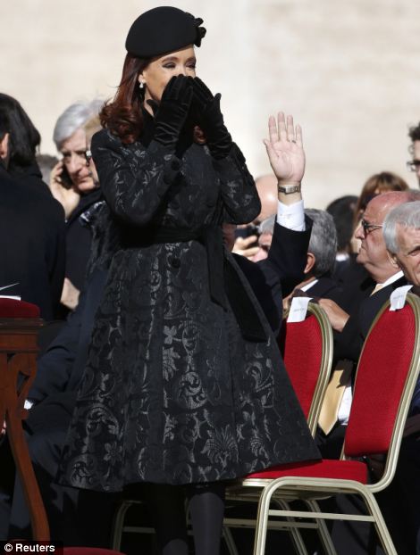 Argentina's President Cristina Fernandez de Kirchner arrives for the inaugural mass